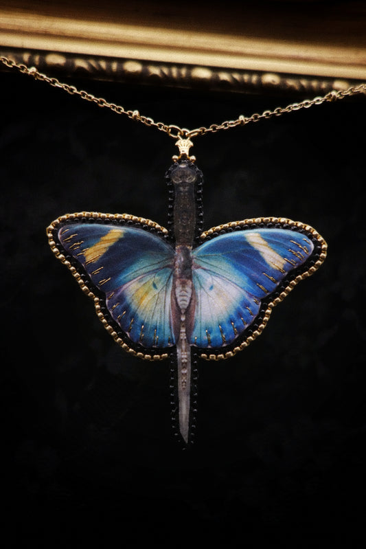 Collier papillon épée